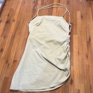 Mable medium runs S tie in the back sea green mini dress.  4. Never worn no tags